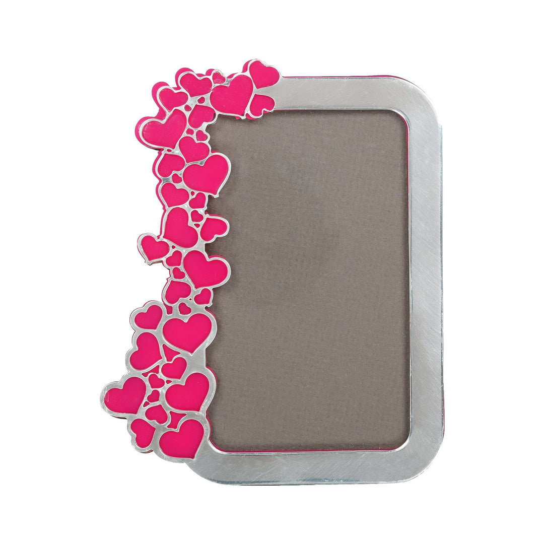 Photo frame With Love is a silver frame that earns its name from a cascade of pink and magenta hearts running down one side - white background