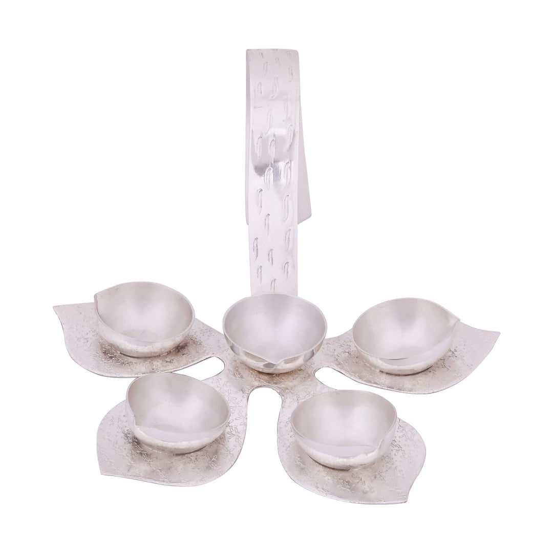 Anjali Aarti Diya is a silver diya shaped like a five petal lotus - white background