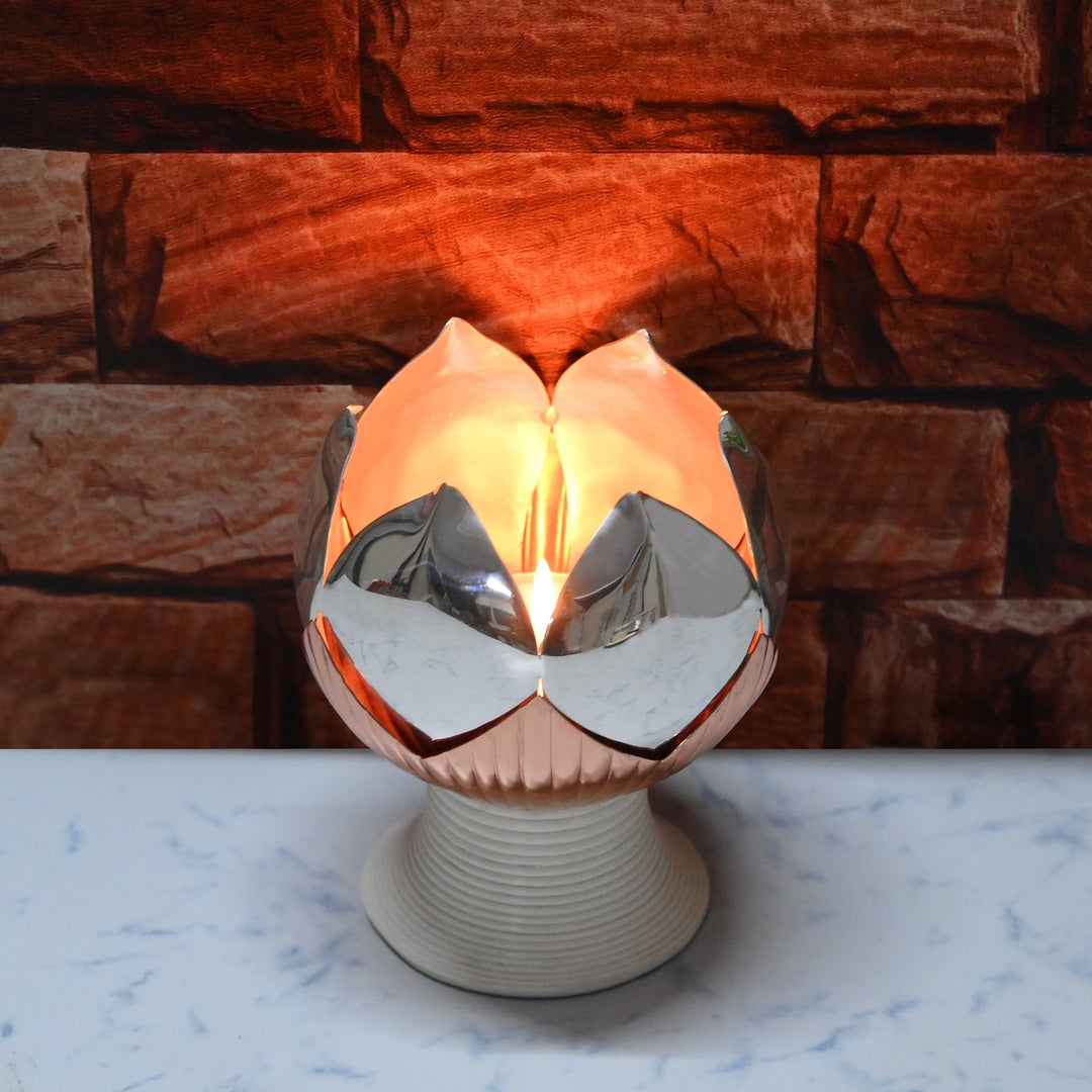 Parijat Diya is a silver diya that opens like a layered lotus bloom – Large