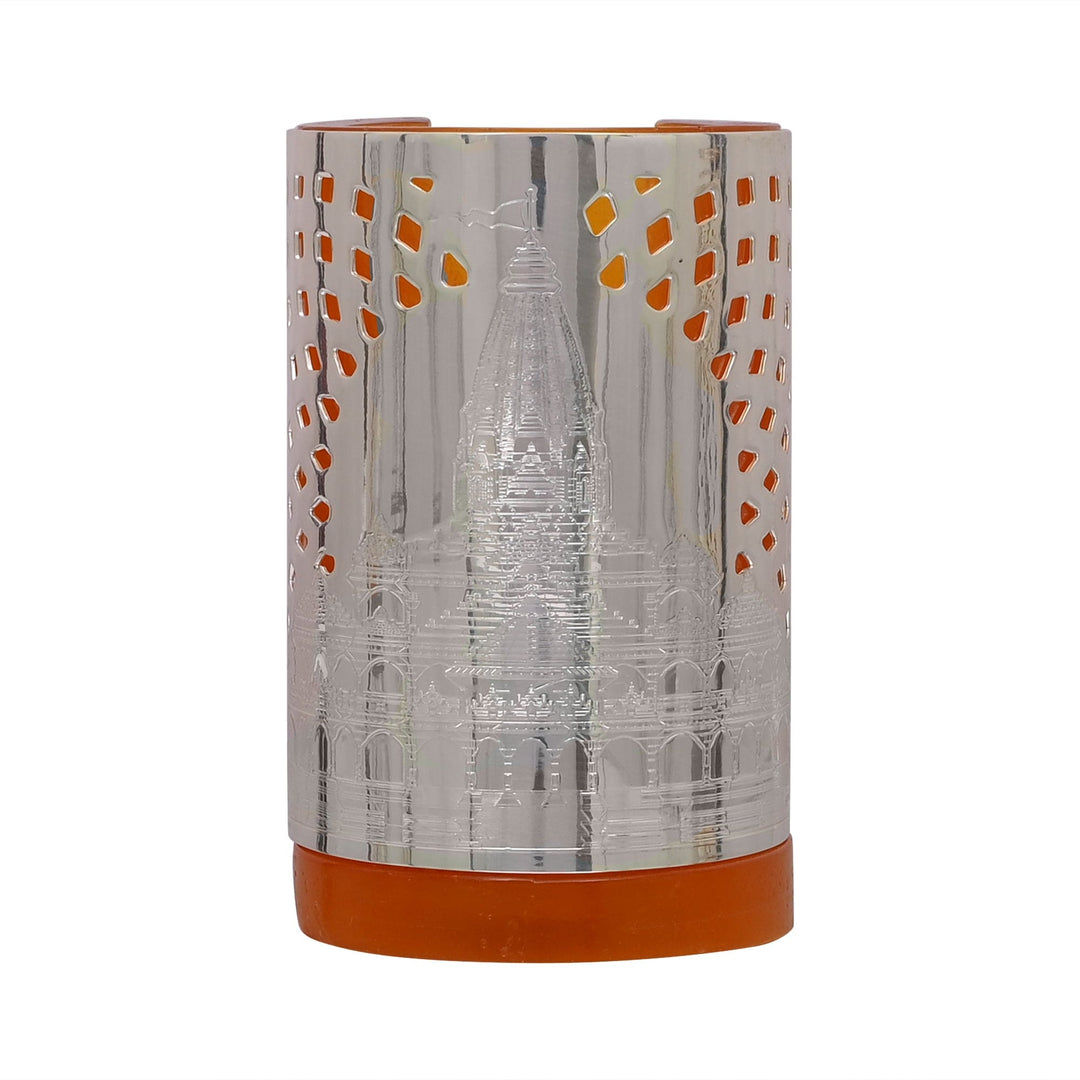 Ram Mandir Votive is a silver cylindrical votive engraved with the spire and arched facade of the Ram Mandir - white background