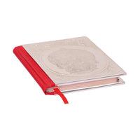 Hanuman Chalisa takes the form of a silver embossed medallion of Hanuman's face set inside an oval frame on the cover of a Hanuman Chalisa book - white background