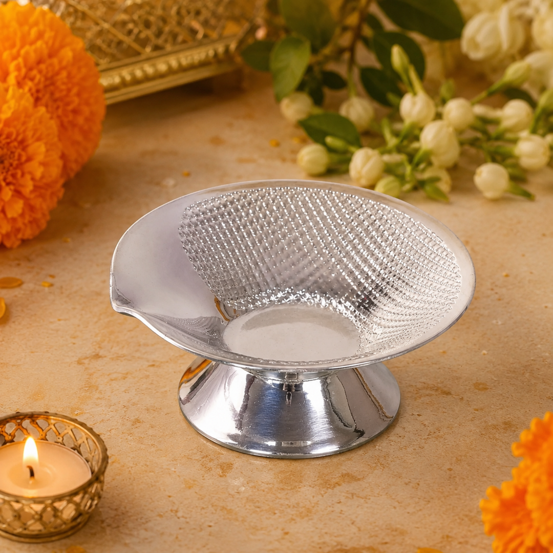 Divinity Diya places a single scalloped lotus cup at the centre of an open wirework tray, raised - angle 2