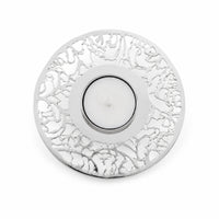Tree Of Life Round Tealight Large is a silver tealight holder laid out as a flat plate, a bold branching tree border around a plain polished ring and a recessed candle well - white background