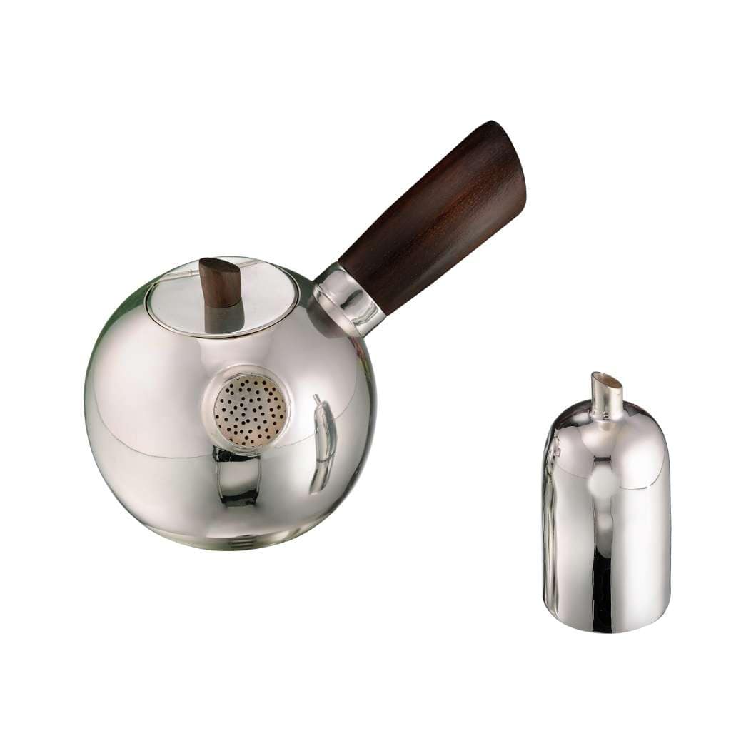 Tea Set Earth builds its silver teapot around a smooth, spherical body and a built-in perforated infuser - white background