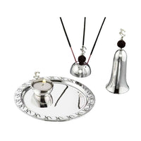 Pooja Thali Rudraksh Set is a silver pooja set topping its bell and incense holder with a small Ganesha silhouette and genuine rudraksh beads - white background