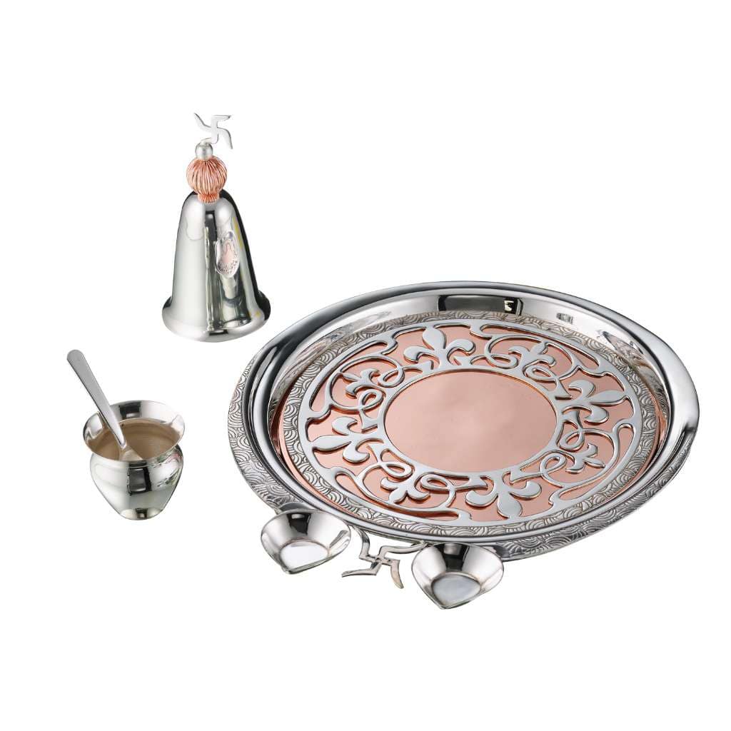 Pooja Thali Smriti Set centres a rose-gold filigree panel on the round tray of a silver pooja thali - white background