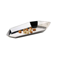 Tray Braque is a faceted, boat-shaped silver tray that pairs a mirror-polished centre with a hammered-texture finish along both pointed ends - white background