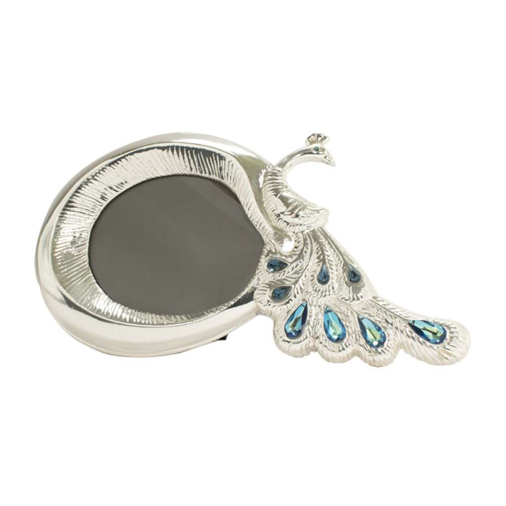 Photo Frame Peacock is a sterling silver frame with a rounded oval shape and a sculpted peacock perched at one edge