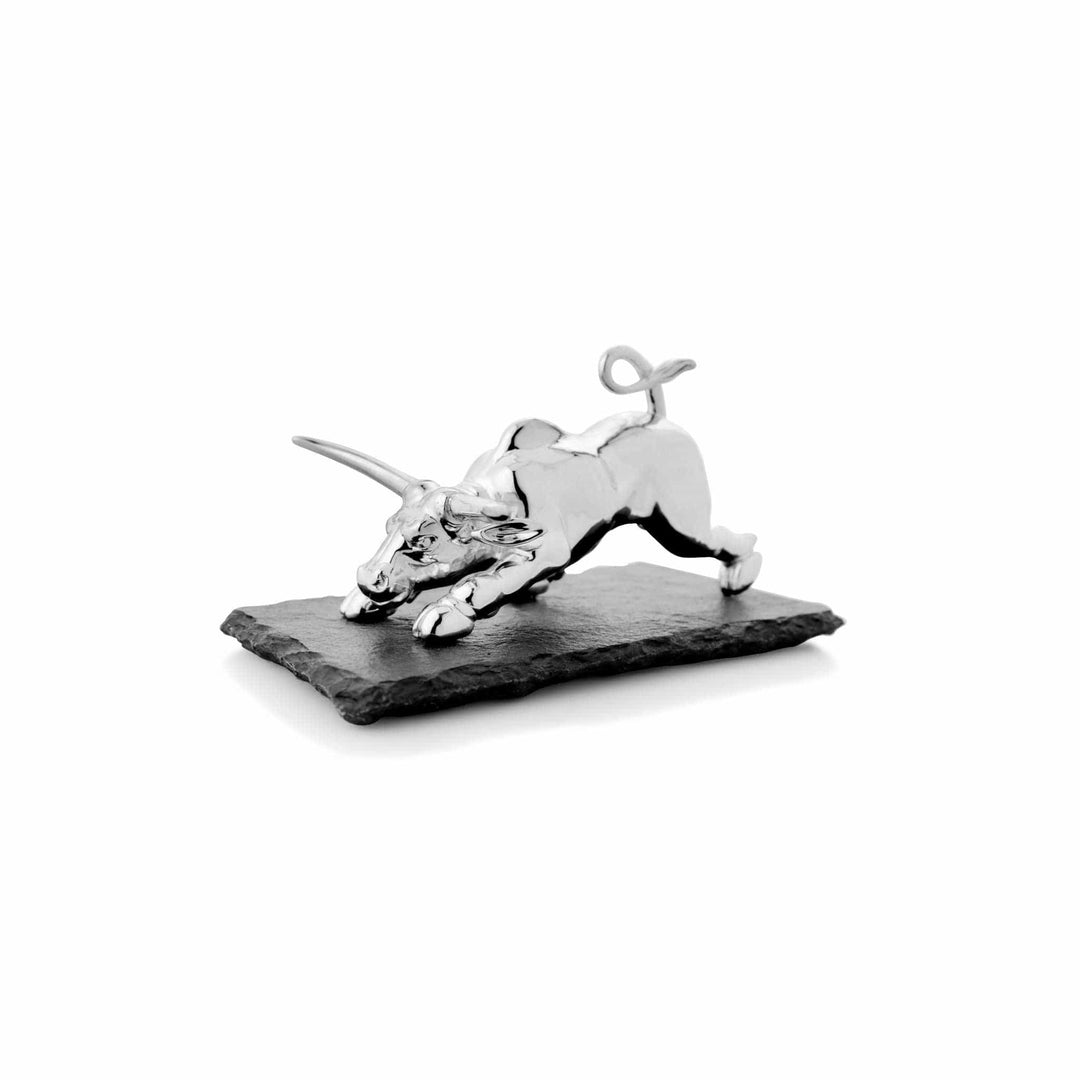 Decorative Figurine Torero Bull is a sterling silver figurine of a bull mid-charge, head lowered and tail curled, cast to a gleaming finish - white background
