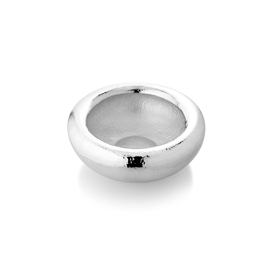 Curved Bowl Hammered is a deep, curved silver bowl that runs a hammered texture across its surface, catching light from every angle – Small