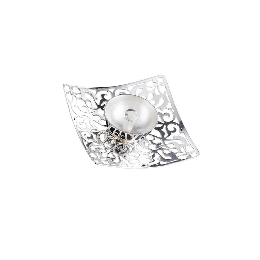 Diya Moksha doubles as a tea light holder for a puja room or a side table, a silver diya cut in a dense square piercework pattern – Small