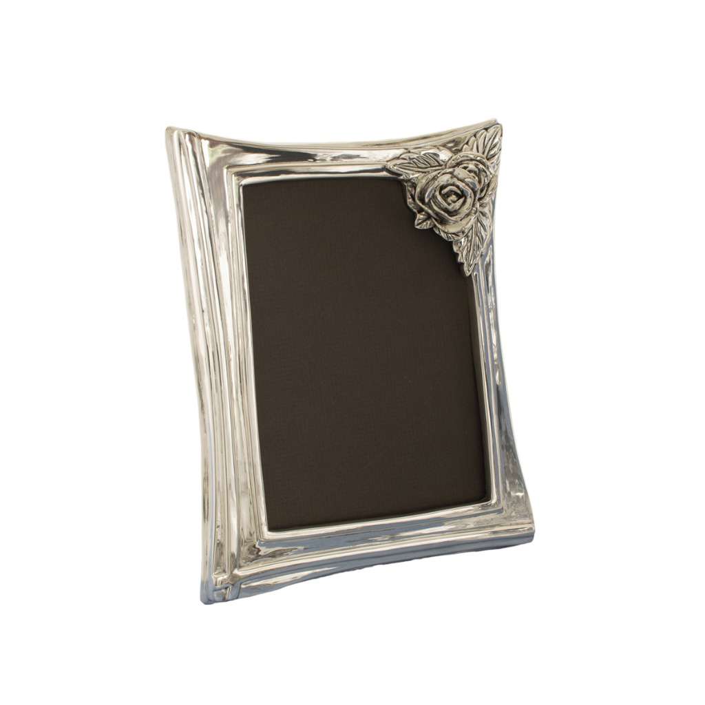 Photo Frame Rose is a sterling silver frame with a gently curved, wind-blown silhouette instead of straight edges – Small