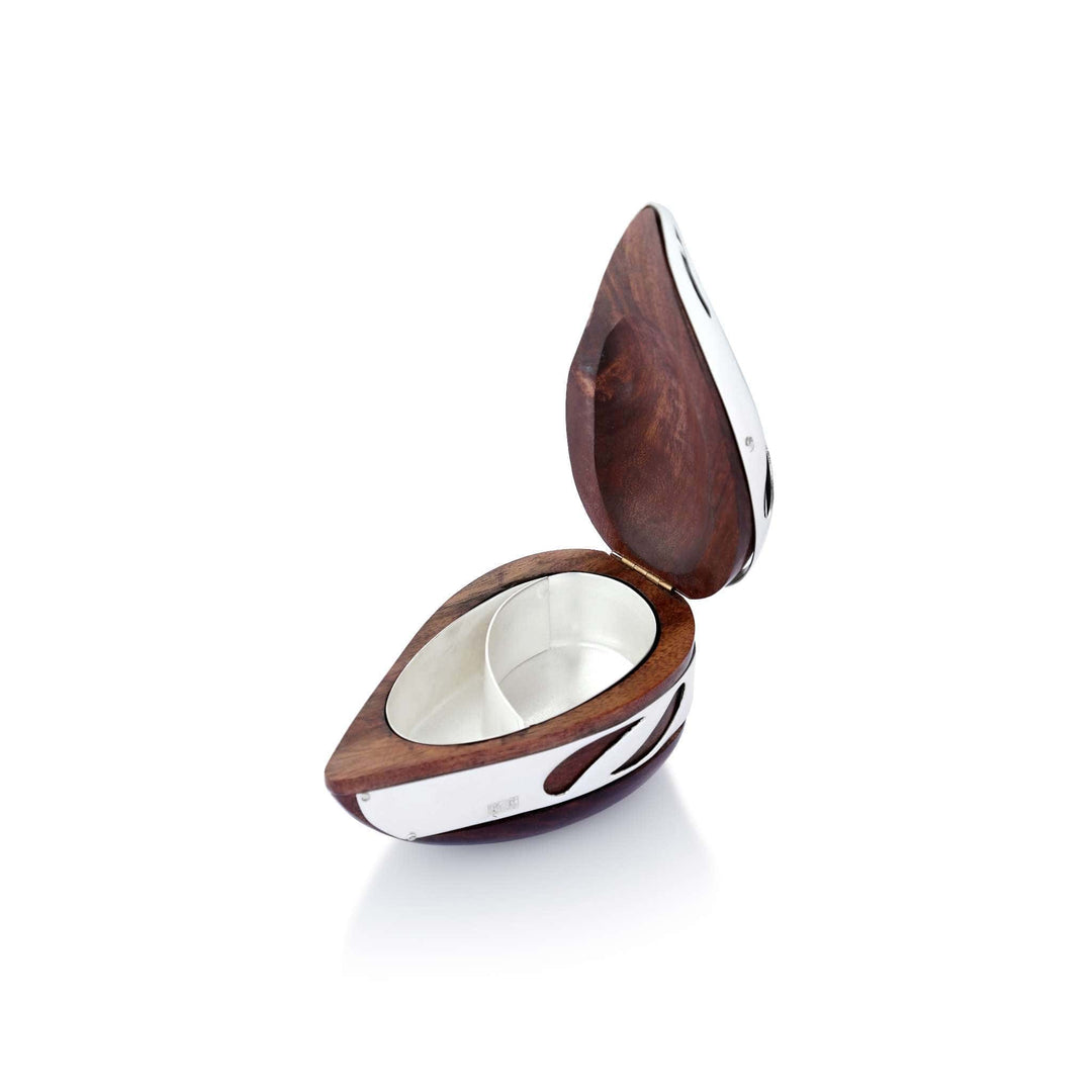 Box Mouth Freshner Blossom is a leaf-shaped silver box with rosewood inlay flowing in a petal-patterned design across its polished surface - angle 3