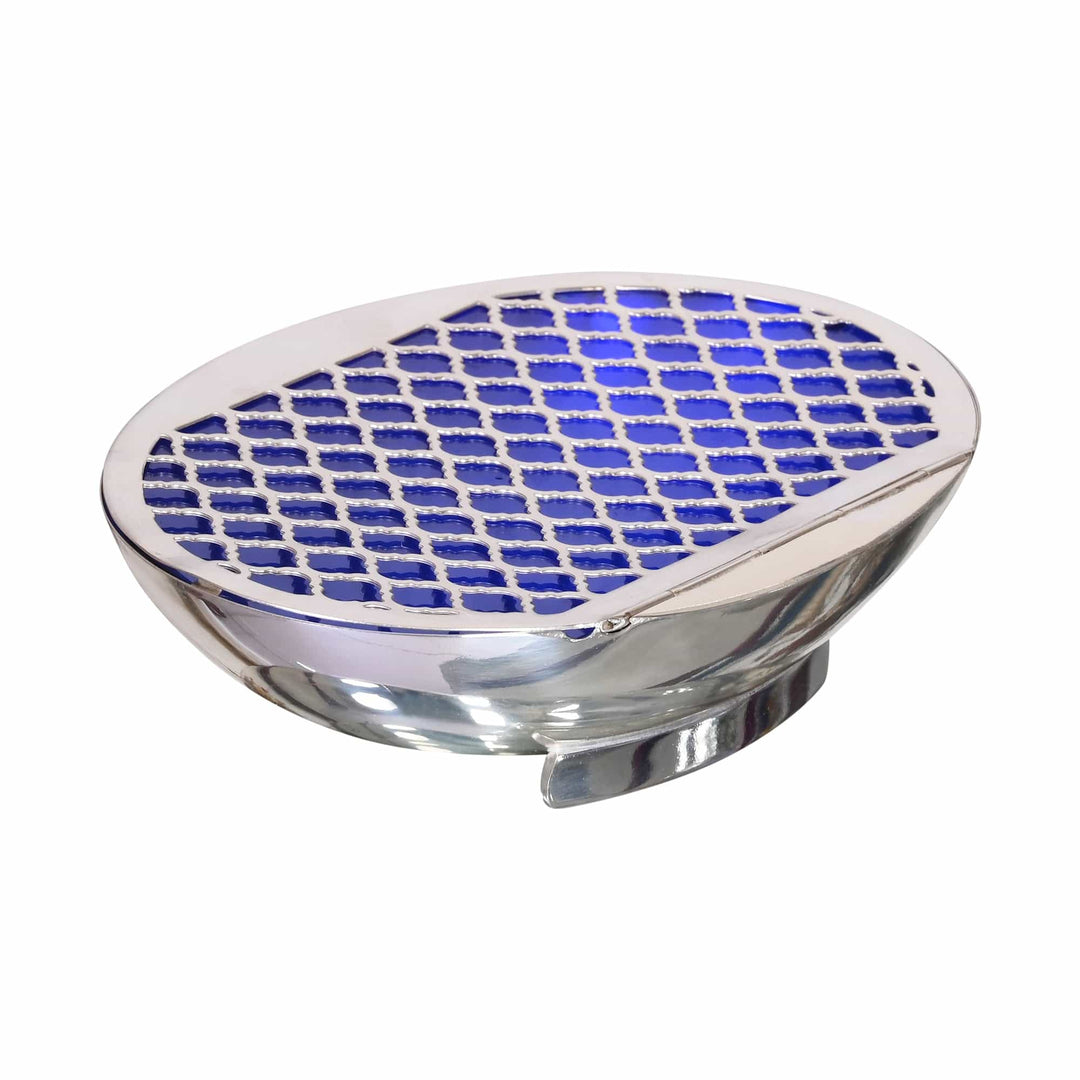 Ornate Box is an oval silver box with a pierced lattice lid, opening on a hinge to reveal a coloured enamel lining beneath - white background