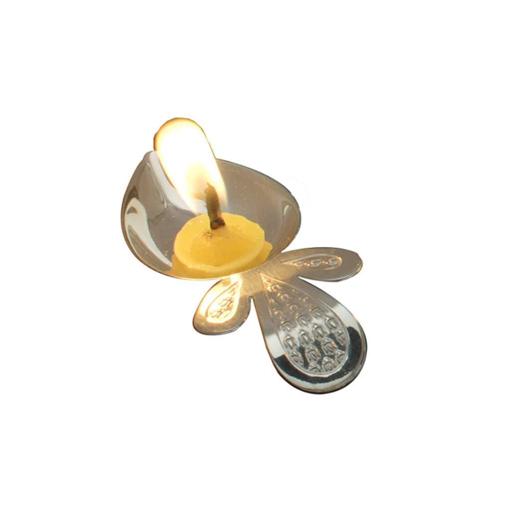 Diya Radiance is a silver diya that opens into a single petal shape, its handle etched with a trident in tribute to Lord Shiva - size reference