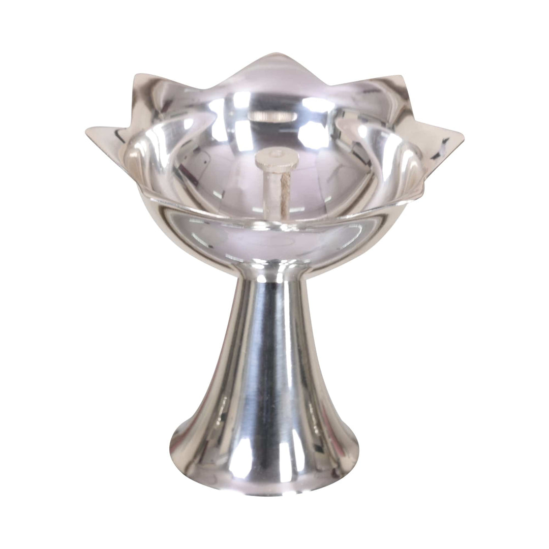 Single Akhand Jyot is a silver diya that lifts a lotus-petal shaped oil bowl onto a tall, trumpet-shaped pedestal - white background