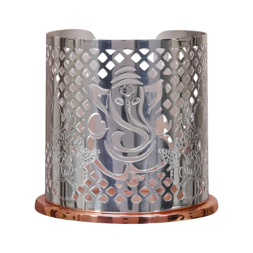 Ganesh Votive is a silver votive holder with Ganesha&