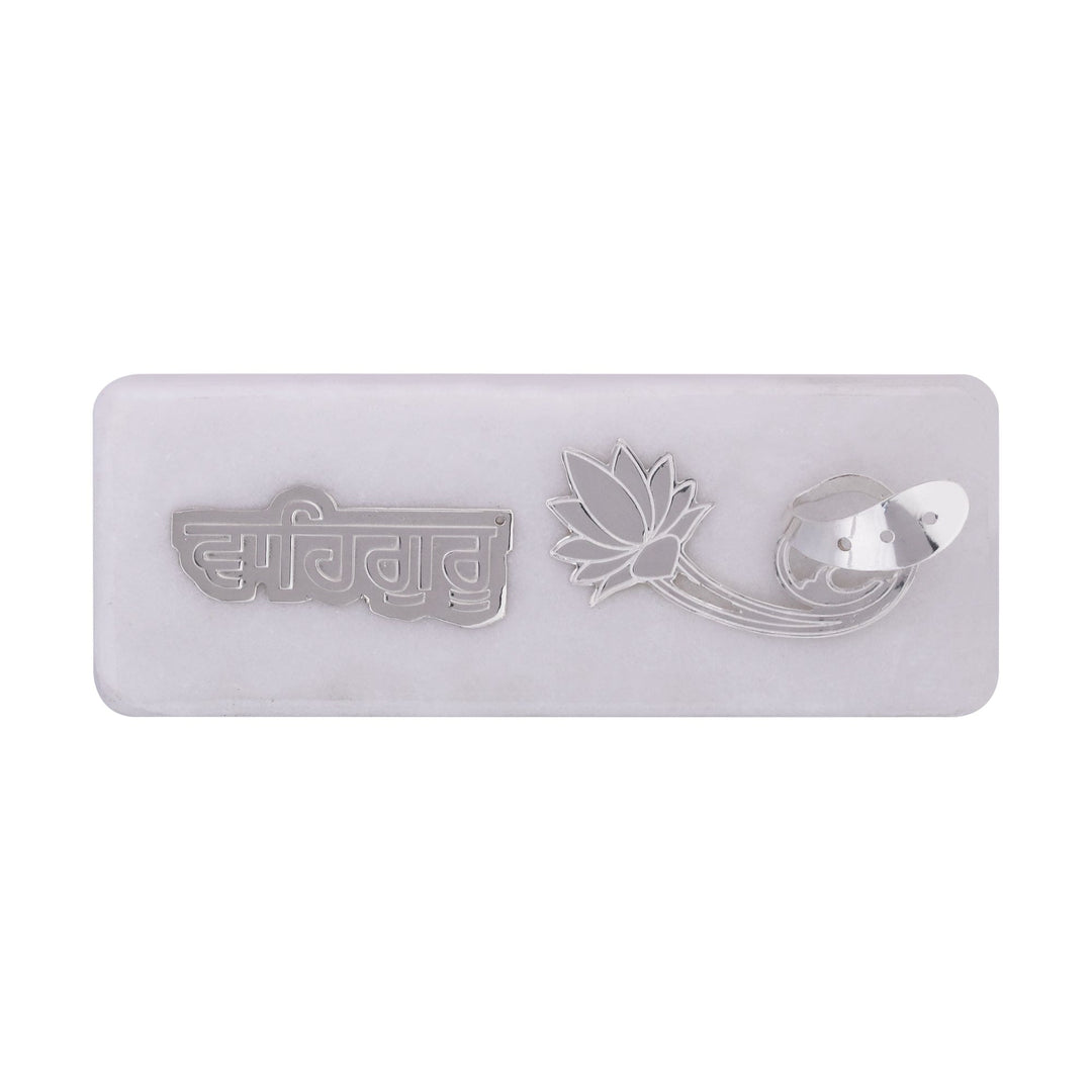 Waheguru Incense Holder cuts the word Waheguru in Gurmukhi script on this silver incense holder - white background