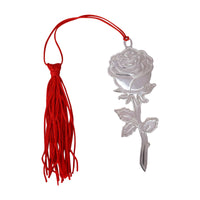Rose Bookmark is a slim silver bookmark with a single rose-motif detail at the top, finished in a soft, polished shine - white background