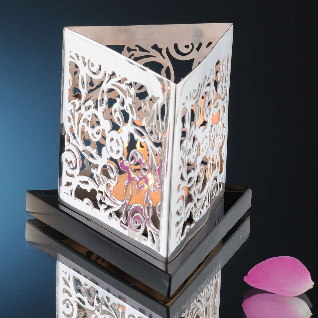 Tealights Holder Delta rises as a silver tea light holder shaped into a triangular tower, its three - angle 2