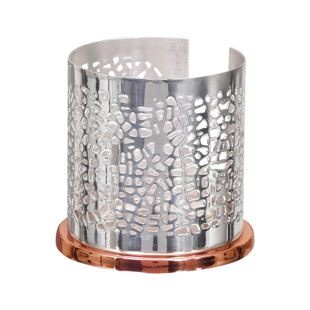 Dry Leaf Votive is a silver candle stand with an organic, pebble-like pattern running the full height of its cylinder - white background
