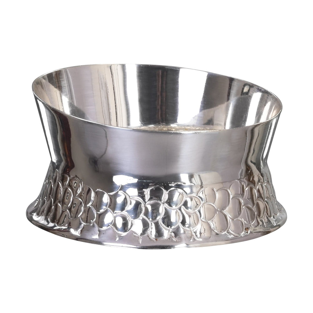 Bubble Nut Bowl is a silver nut bowl with a raised, bubble-like texture banding its lower half, its waisted - white background
