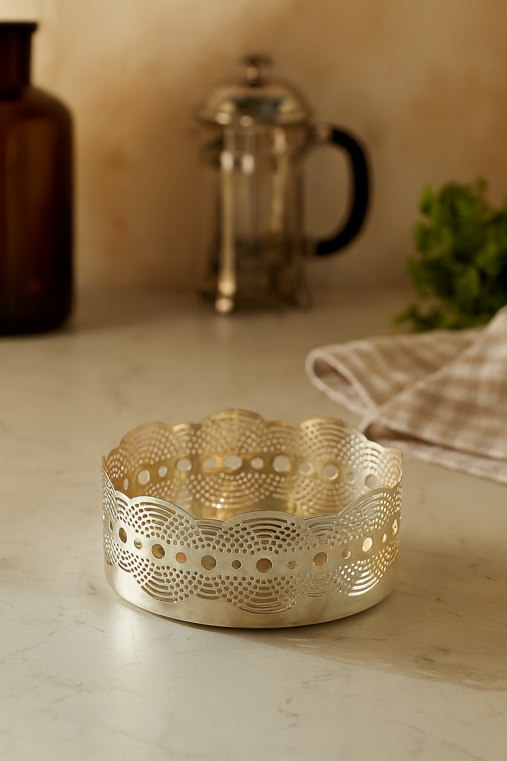 Oval Illusion Loops Basket is a silver basket with a scalloped, crown-like rim, its sides pierced all - angle 2