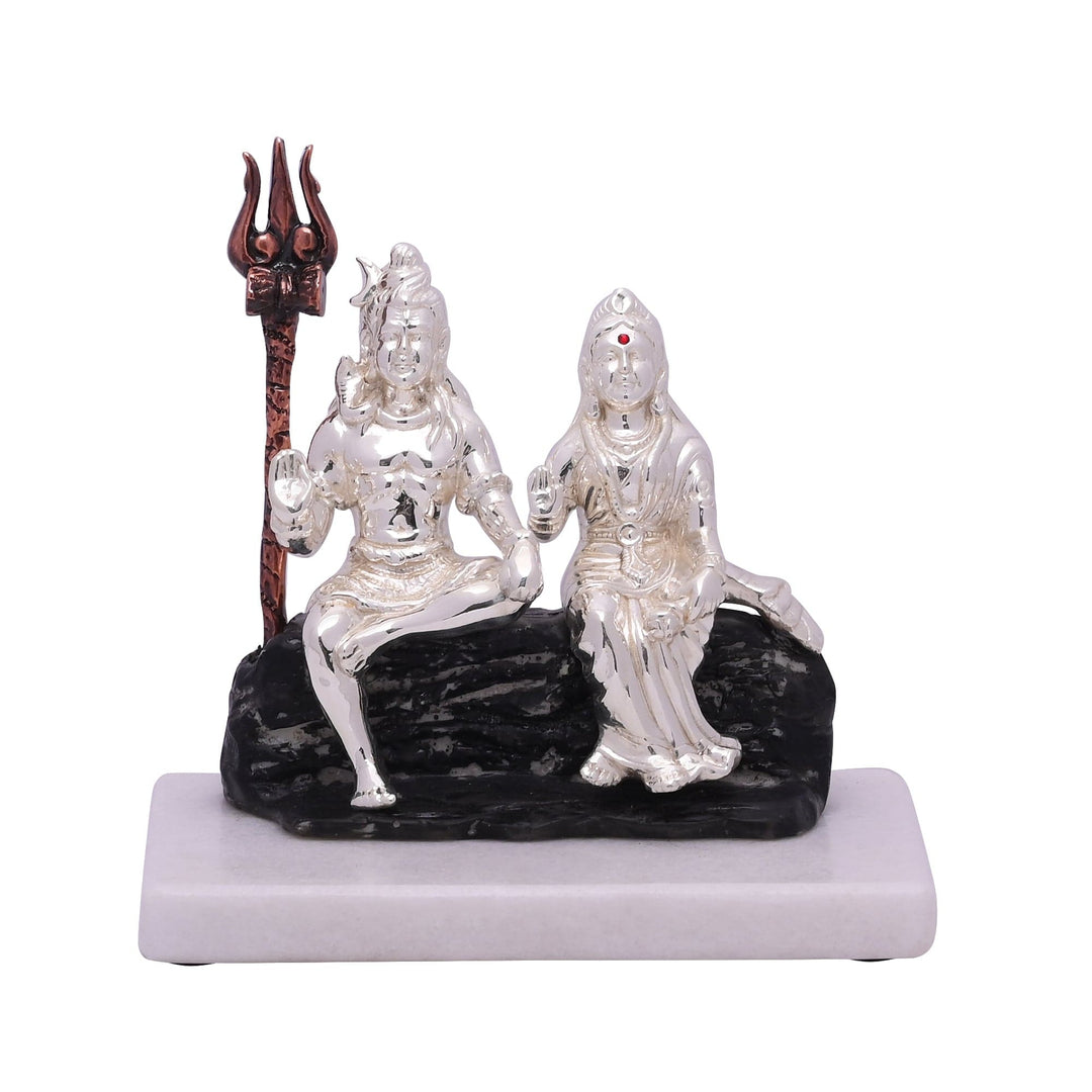 Shiv Parvati on Stone Base brings a sterling silver Shiva idol together with Parvati on a textured black stone outcrop - white background