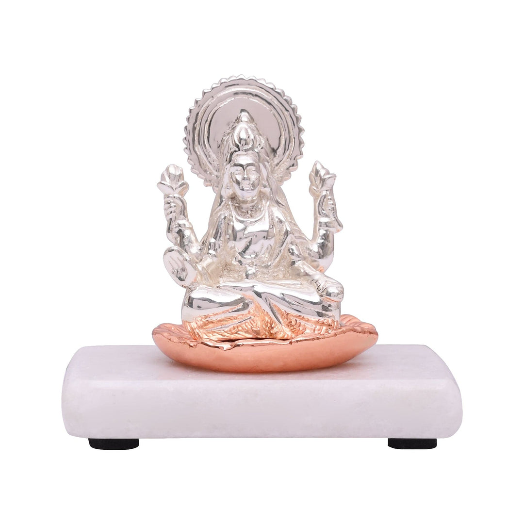 Laxmi On Flower is a sterling silver Lakshmi idol seated in meditation on a lotus finished in a warm copper tone - white background