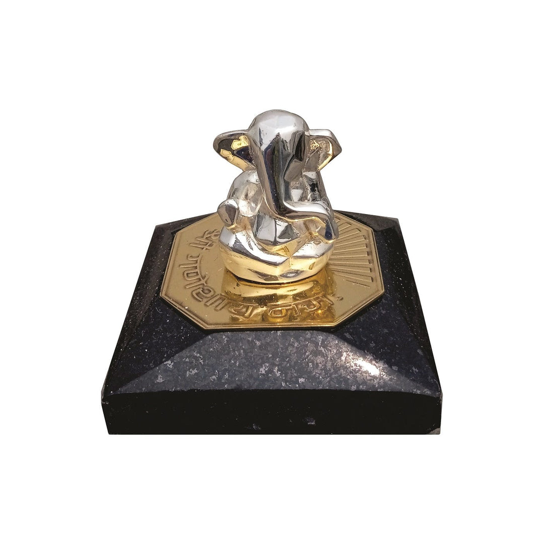 Eminence Ganesha is a sterling silver Ganesha idol that appears as a compact seated bust - white background