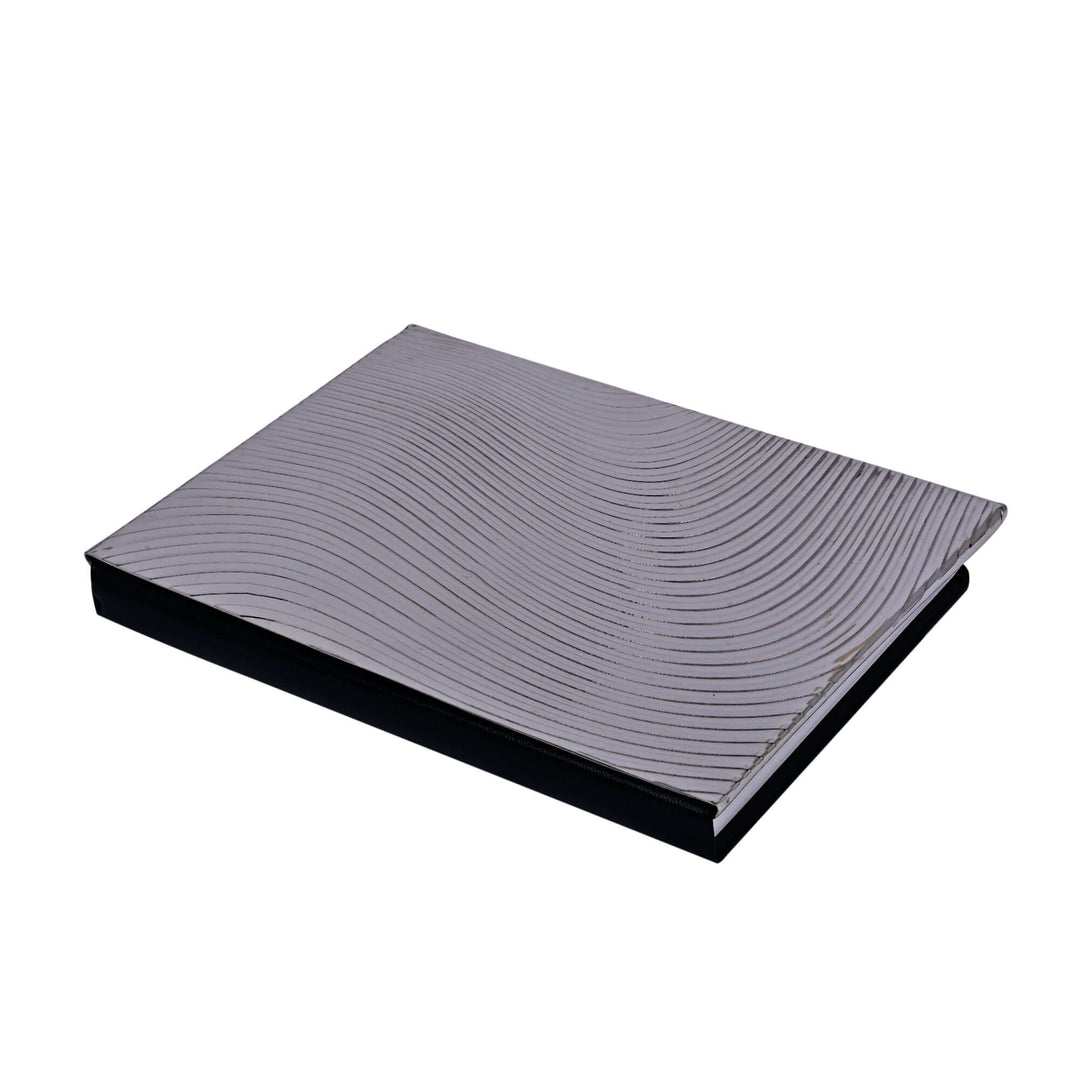 Fluid Diary is a silver diary with a cover that carries the same wave-patterned surface as the rest of the Fluid desk collection - white background