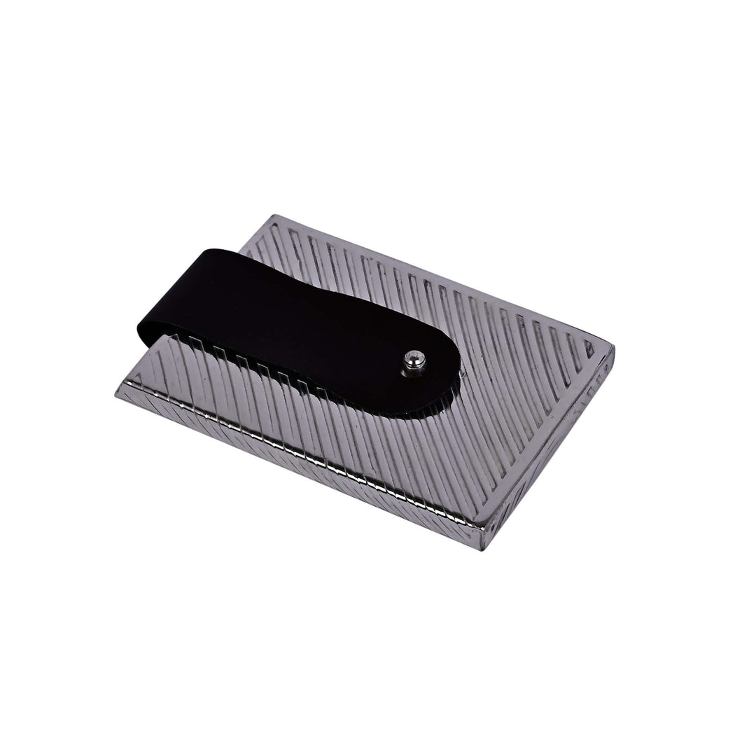 Fluid Card Holder is a silver card holder with a fluid, wave-like silhouette, finished in a dark - white background