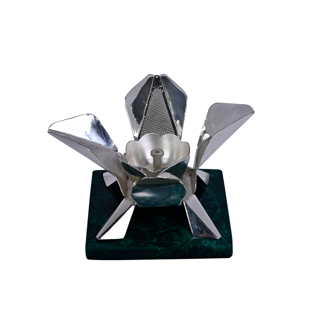 Tealight Holder Cosmic Lotus is a silver tealight holder shaped as a fully bloomed lotus, its petals - white background