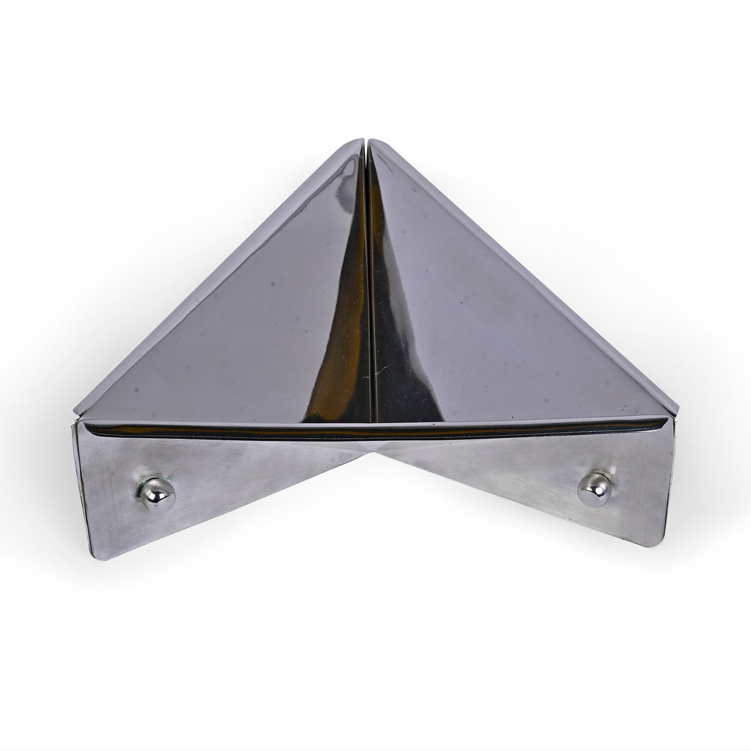 Trikona Bowl folds a single sheet of mirror-bright metal into a triangular silver bowl - white background