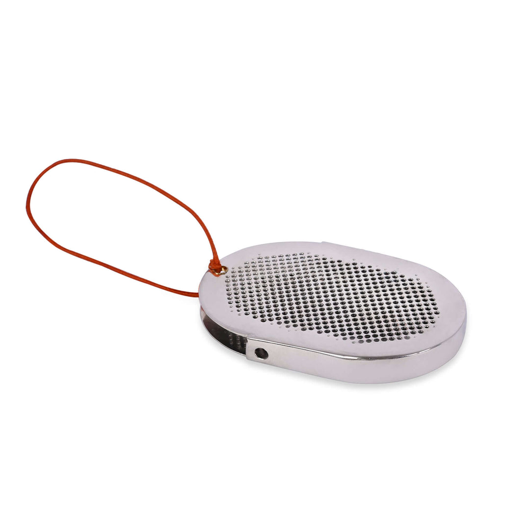 Aroma Glow Hanging Diffuser is a smooth, oval silver diffuser that perforates a fine dot pattern across its face - white background