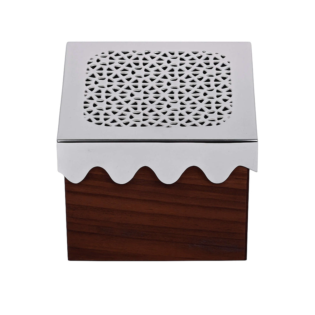 The Star Box is a silver box with a fretwork lid paired to a rosewood-toned wood body - white background