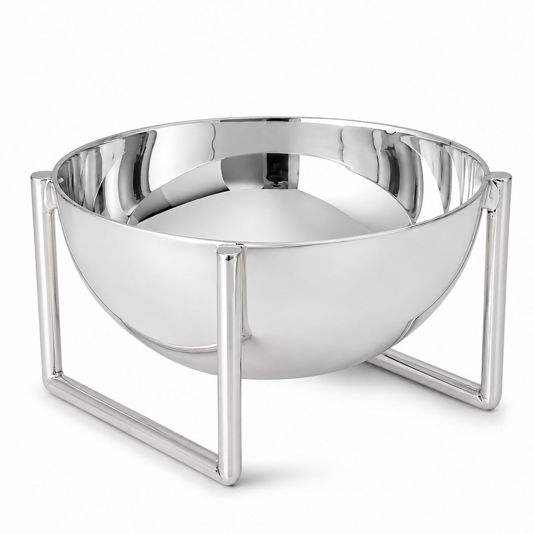 Arco Nut Bowl is a silver nut bowl, a mirror polished hemisphere held clear of the table in a squared open frame - white background