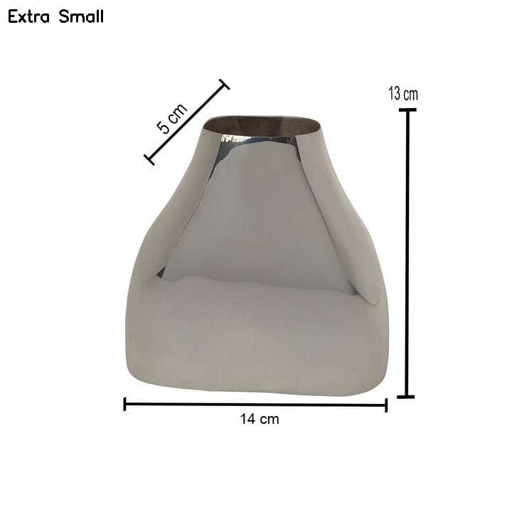 Bottle Vase is a silver vase with a smooth, sculptural silhouette – Small