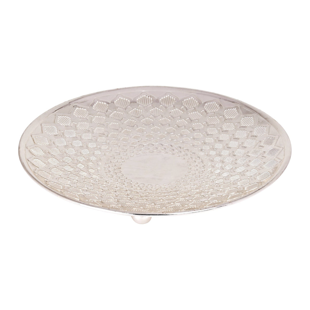 Illusion Round Dish carries a dense, embossed pattern radiating out from the centre of a round silver dish – Small