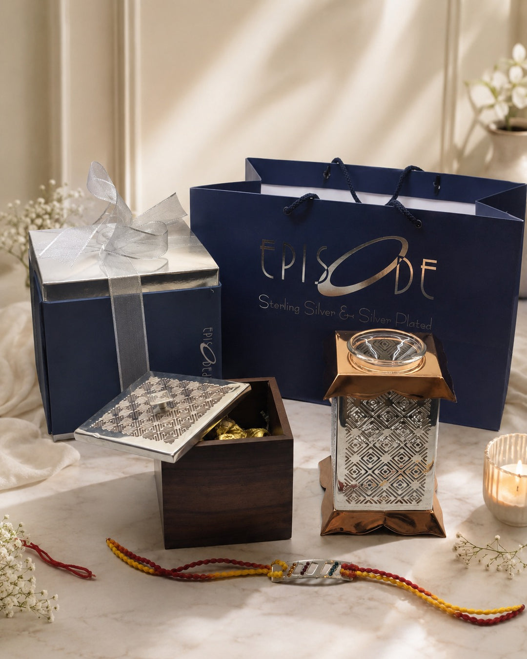 Rakhi Gift Set 2 - Signature Box, Signature Oil Burner and Mauli Rakhi with chocolates in an Episode gift box