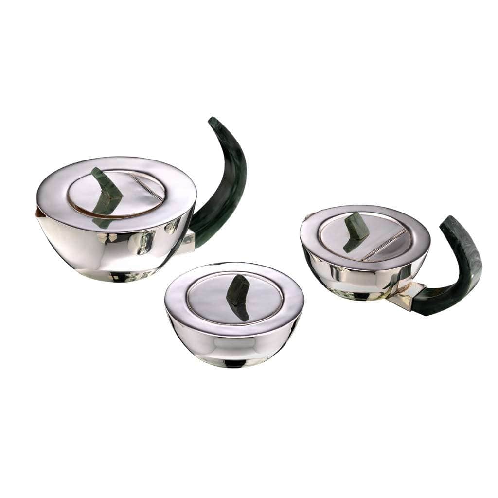 Tea Set Opus brings together a silver teapot, creamer, and sugar bowl - white background