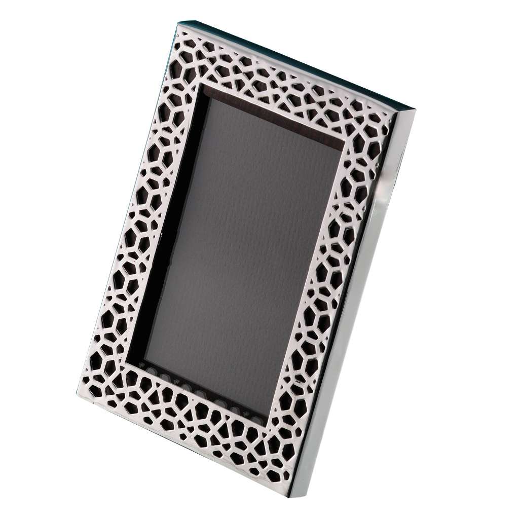 Photo Frame Network is a silver frame cut into a fine geometric lattice border, the kind of detailed openwork classic in architecture – Small