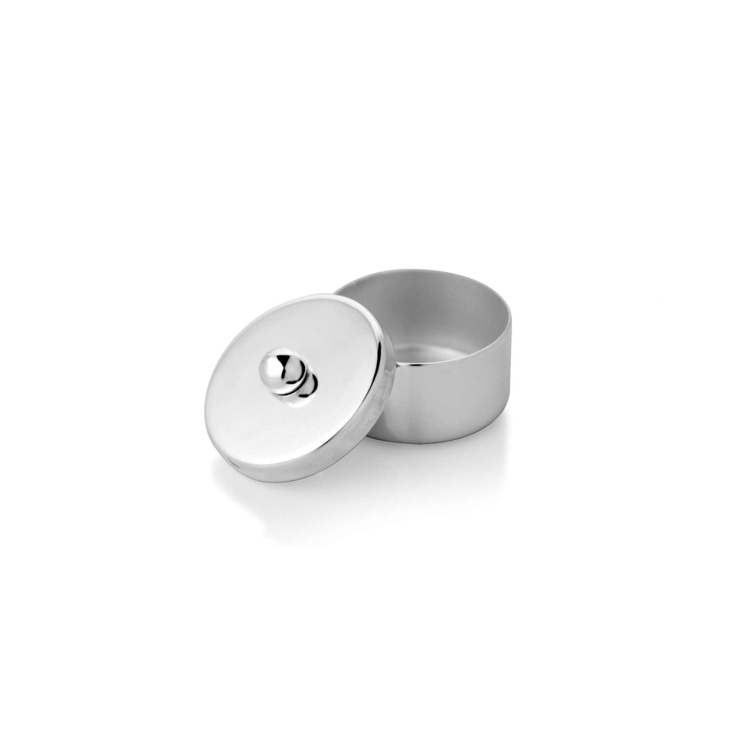Sindoor Box is a small round silver box with a plain polished lid and a single ball knob for a handle, sized to hold sindoor - white background