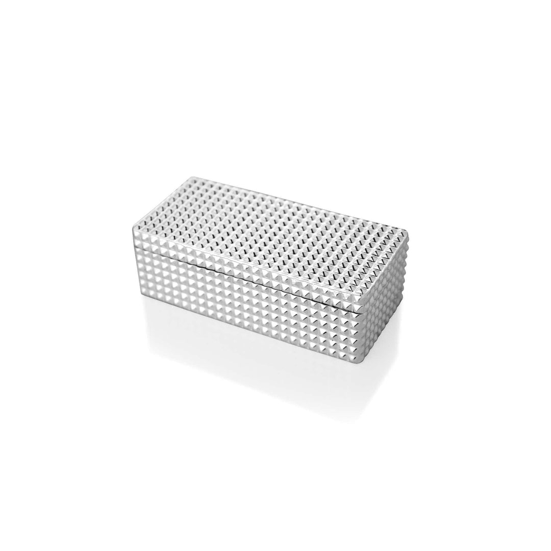 Box Spike Rectangle is a silver box finished in an allover pyramid-stud pattern, its rectangular block catching the light from every facet - white background