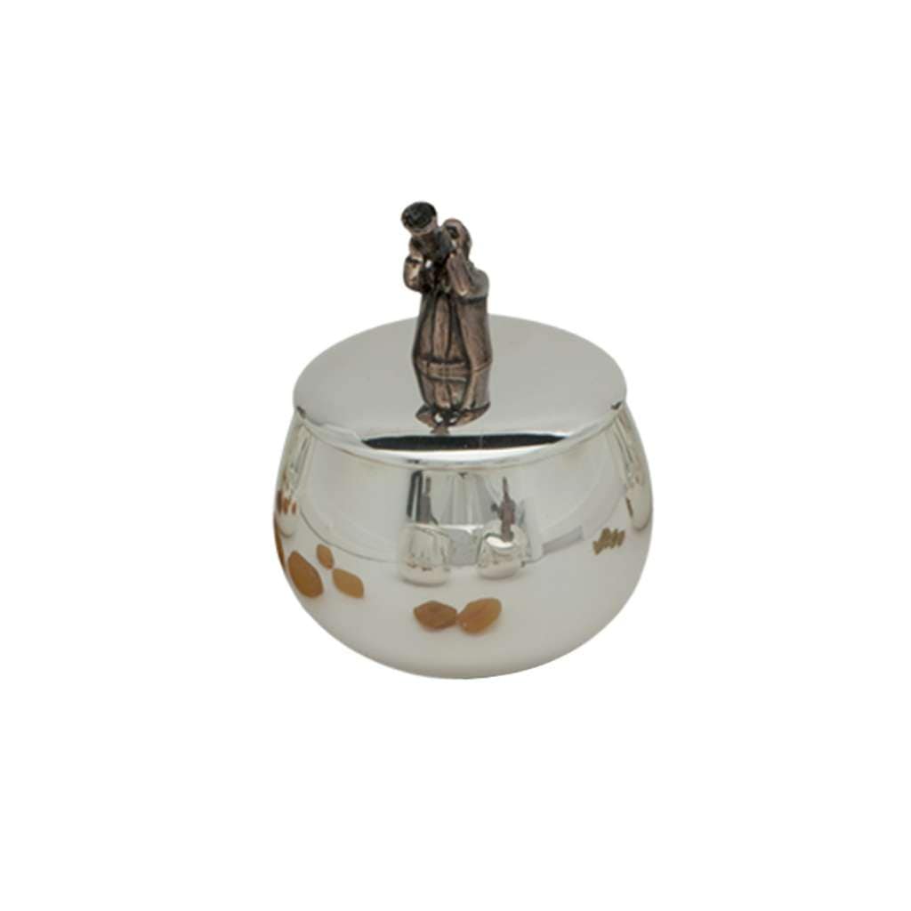 Box Jazz Trumpet is a silver box with a copper-toned trumpeter, horn raised, topping the lid - white background