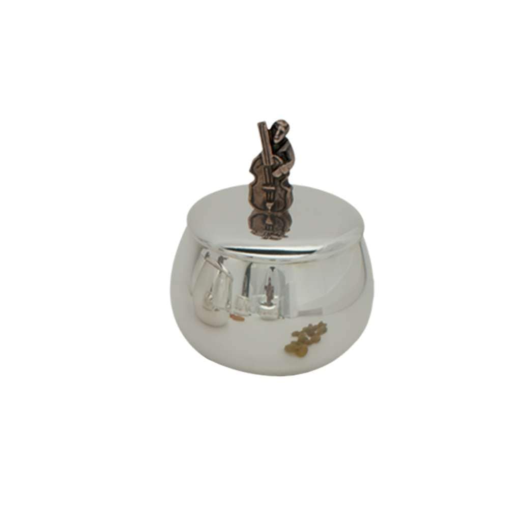 Box Jazz Bass is a silver box with a copper-toned bass player perched on the lid - white background