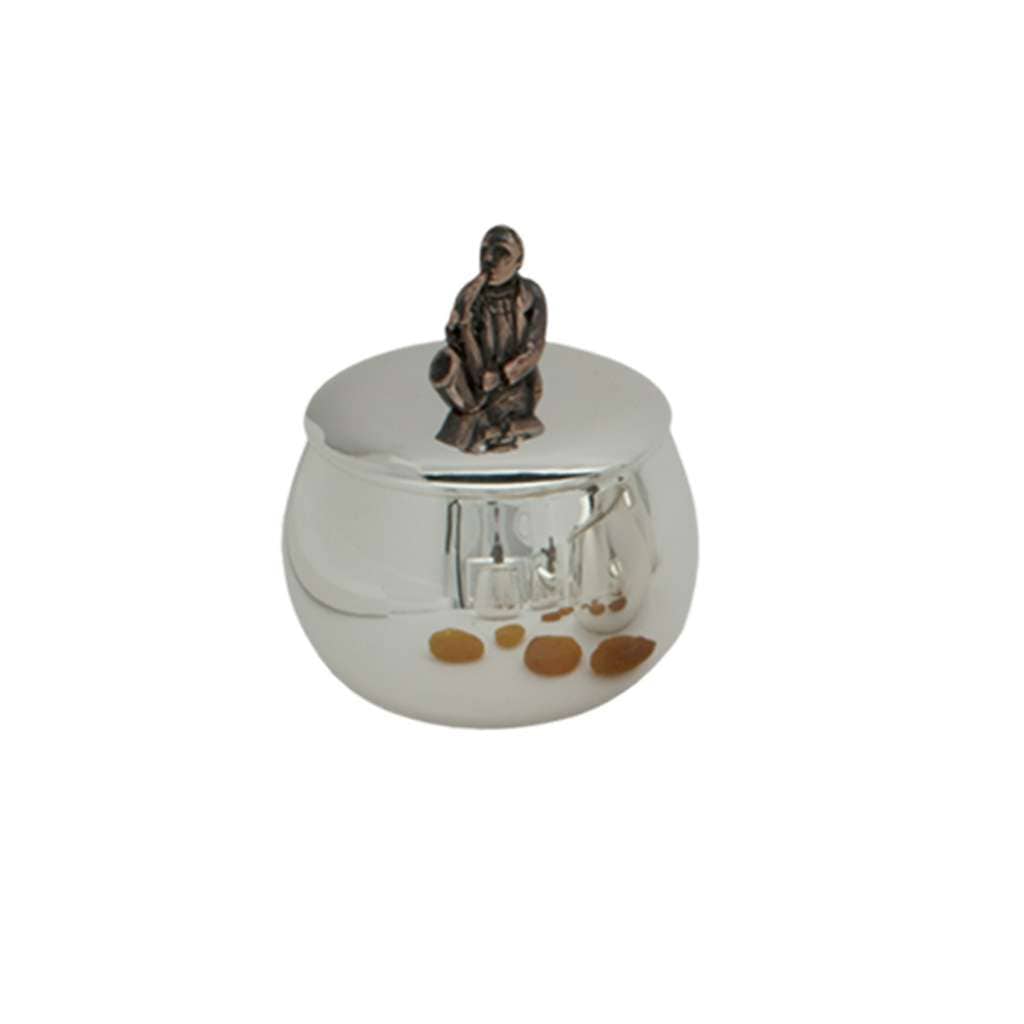 Box Jazz Saxophone is a silver box with a copper-toned saxophonist leaning into his instrument atop it - white background