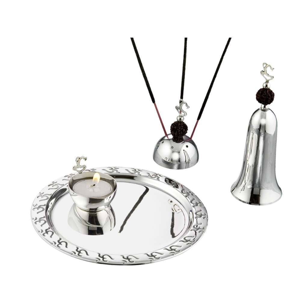 Pooja Thali Rudraksh Set is a silver pooja set topping its bell and incense holder with a small Ganesha silhouette and genuine rudraksh beads - white background
