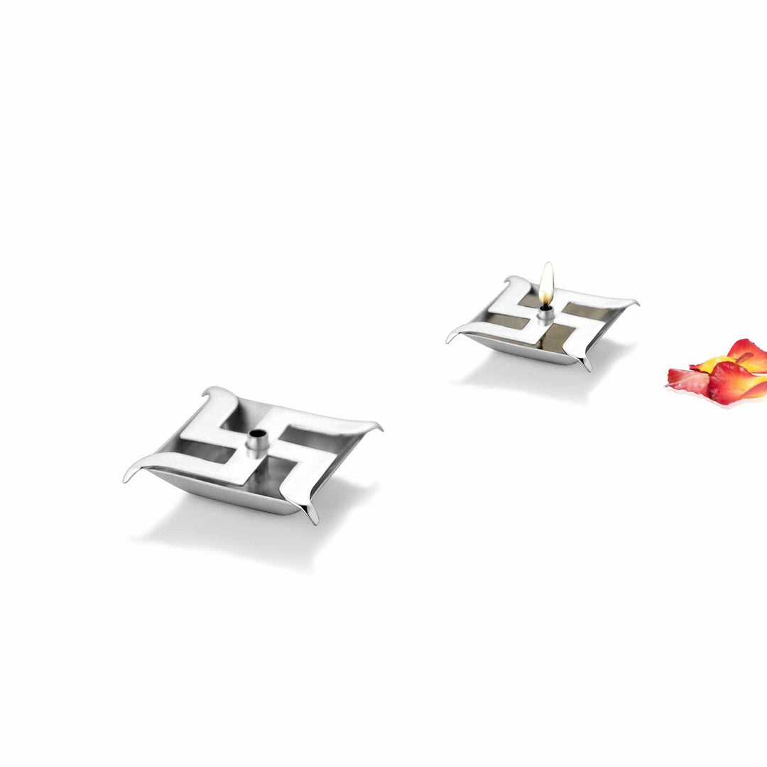 Incense Holder Swastik cuts a swastik, a symbol of peace and prosperity in Hindu tradition - white background