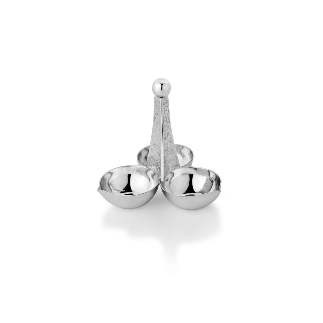 Diya Serenity is a silver diya with rounded oil cups fanning around a tall, hammered-texture central column topped with a ball finial – 3 Lite